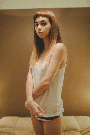 Woman Undressing Animated Gif