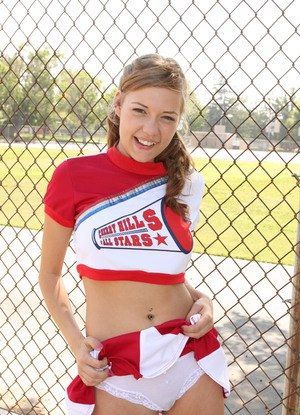 Hot cheerleader with dildo