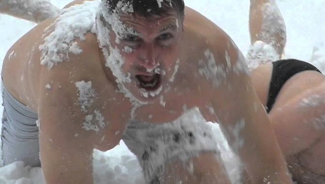 Nude fat dude in snow
