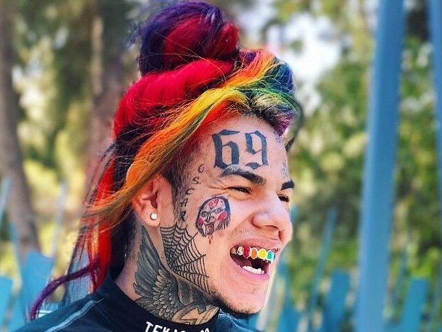 Cake reccomend Rapper with 69 tattoo on face