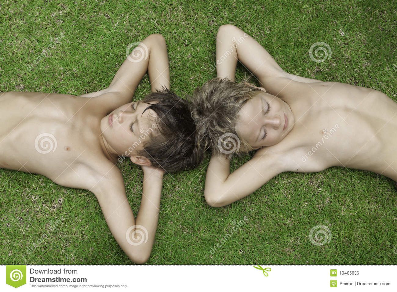 2 boys in bed naked
