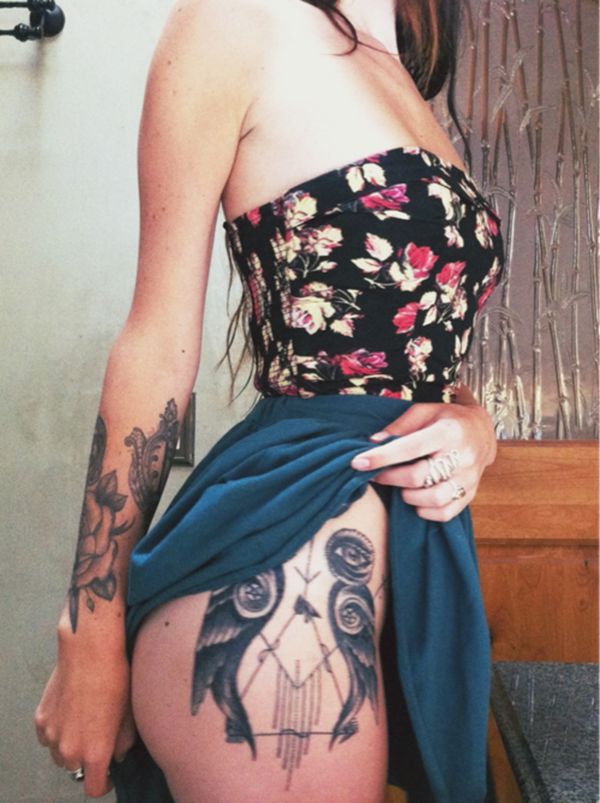 Nude females with large tattoos