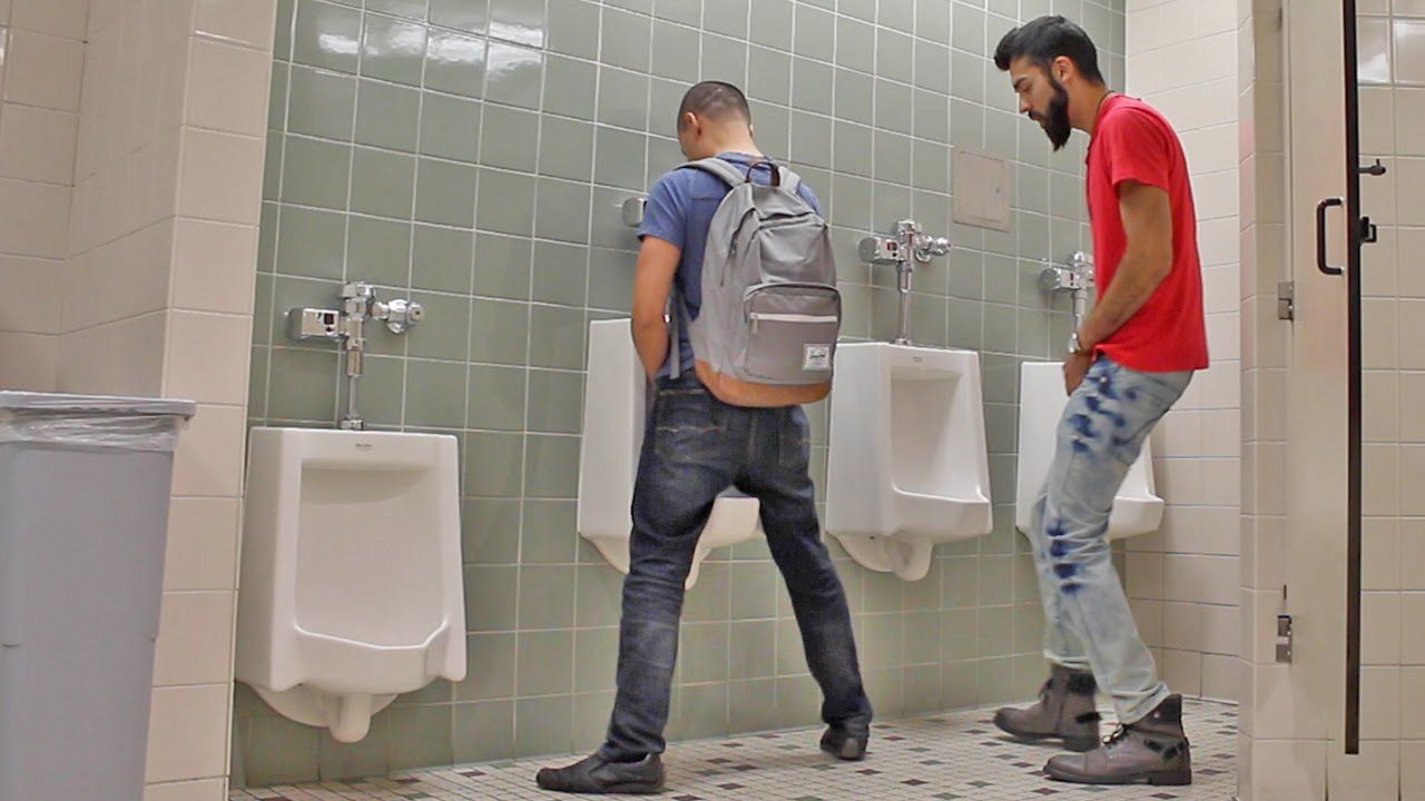 Men peeing in toilet photos