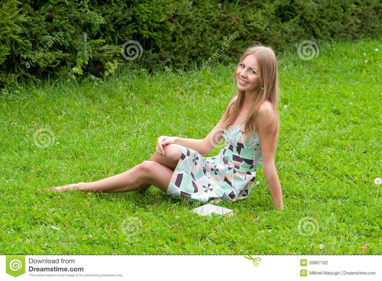 Girl sitting on grass