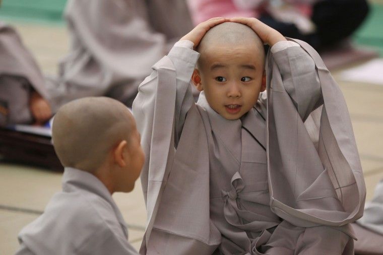 Monks shaved heads